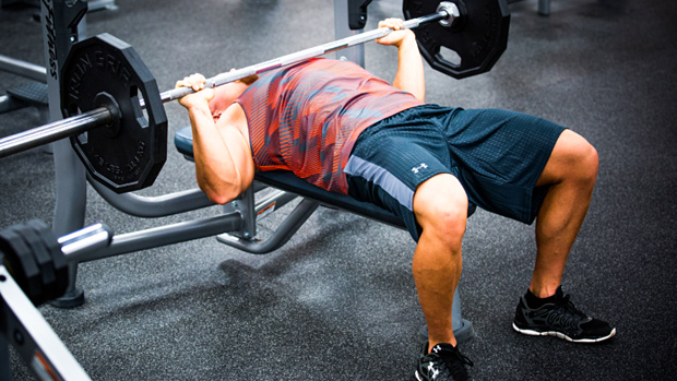 In order to increase your maximum bench press, should you bench close to your max or just do less weight for gradually more reps?